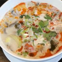 Tom Kha Shrimp · Shrimps in hot and sour soup and coconut milk with lemongrass, lemon leaves, galangal herb, ...