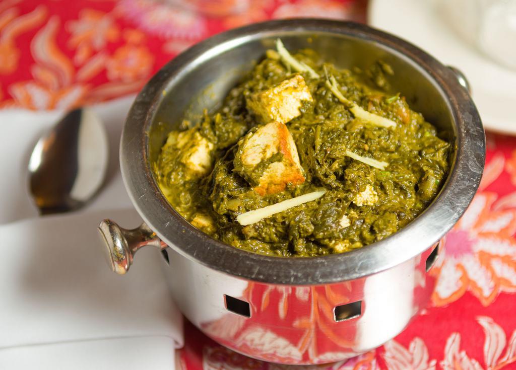 Saag Paneer · Spinach cooked with home-made cheese in cream