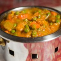 Vegetable Korma · Mixed vegetables cooked with spices and curry.
