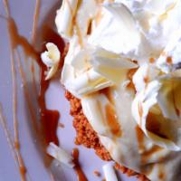 White Chocolate Banana Cream Pie · A graham cracker and chocolate chunk crust, fresh bananas and vanilla pastry cream. Topped w...