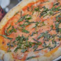 Margherita Pizza · Tomato sauce, homemade mozzarella & fresh basil