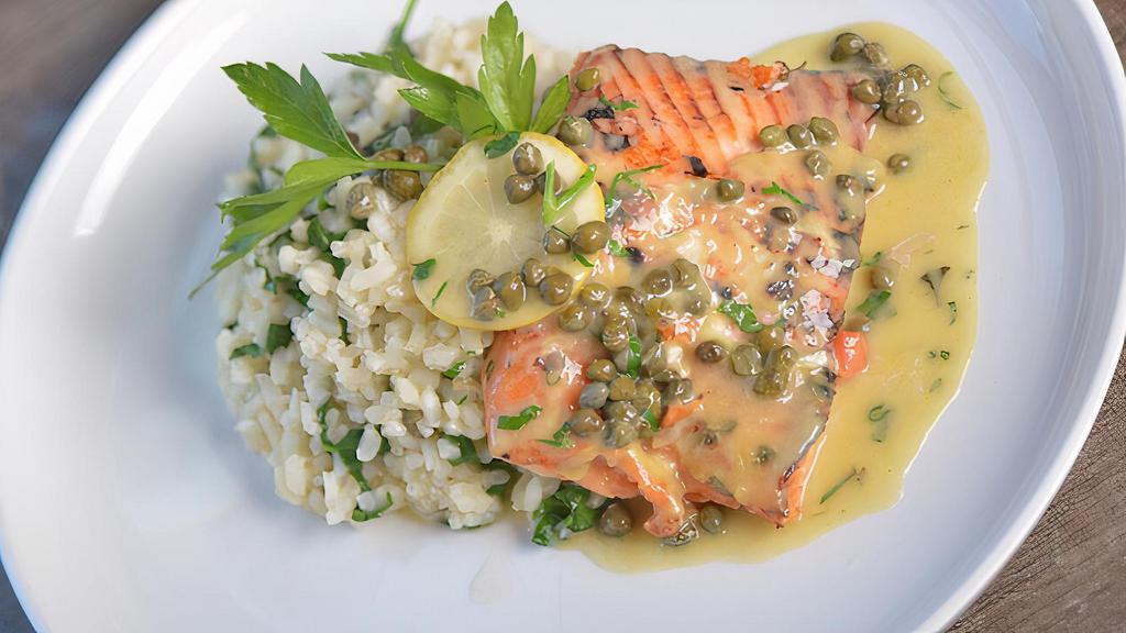Piccata · White wine lemon butter sauce with capers. Served with Parmesan risotto