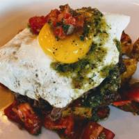 Short Rib Hash · Braised short rib, tomatillo salsa & breakfast potatoes topped with a sunny-side up egg