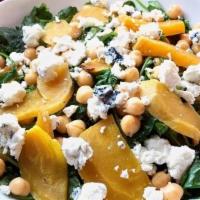 Roasted Beet, Feta And Chickpea Salad · Fire roasted golden beets, feta cheese, marinated chickpeas with mixed greens and vinaigrett...