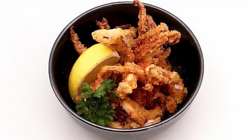 Geso Karaage · イカゲソの唐揚げ Traditional deep-fried squid tentacles with Japanese citrus and chili pepper