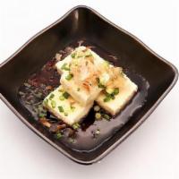 Agedashi Tofu · 揚げ出し豆腐 Deep-fried tofu in hot broth with grated ginger, radish, green onions, and bonito fla...
