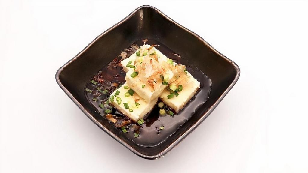 Agedashi Tofu · 揚げ出し豆腐 Deep-fried tofu in hot broth with grated ginger, radish, green onions, and bonito flakes