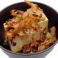 Chilled Tofu · 冷奴 Soft tofu drizzled with a soy sauce dressing or a spicy dressing