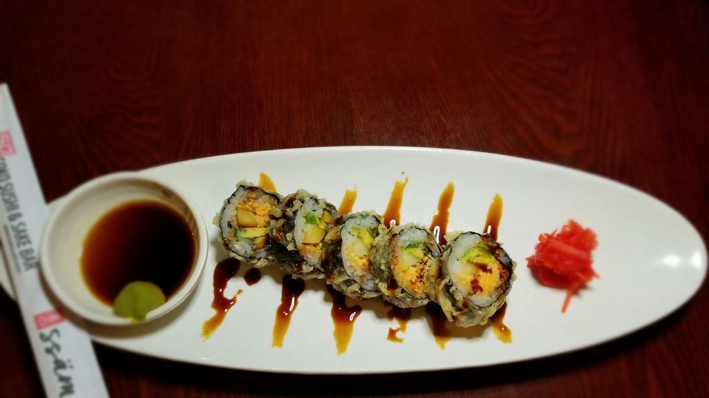  Spicy California · Sriracha Kani Salad, Avocado, and Cucumber. Topped with Eel Sauce.