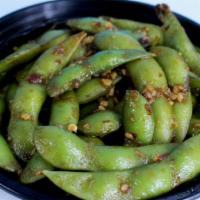 Garlic Edamame · Soy beans sauteed with spicy garlic sauce.