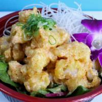 Rock Shrimp Salad · Mixed greens with ponzu sauce topped with deep fried shrimp tossed in a spicy mayo sauce.