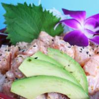Spicy Salmon Don · Spicy salmon over sushi rice with avocado.