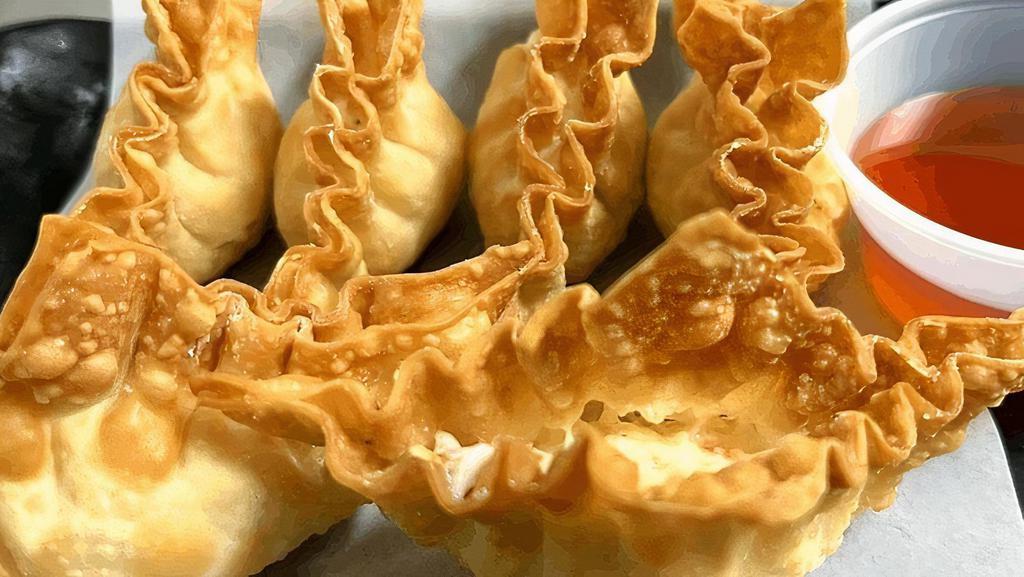 Crab Rangoon · Deep fried wonton wrappers, stuffed with cream cheese Imitation crab meat.