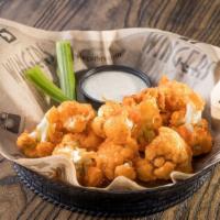 Buffalo Cauliflower · Fresh cauliflower hand battered in our signature buffalo sauce. Served with house-made Ranch.