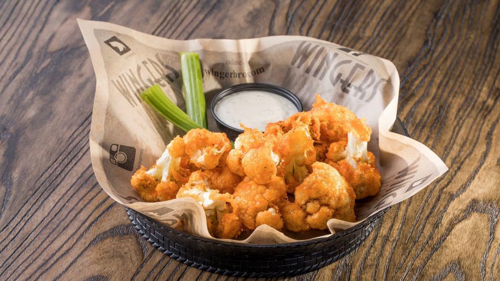 Buffalo Cauliflower · Fresh cauliflower hand battered in our signature buffalo sauce. Served with house-made Ranch.