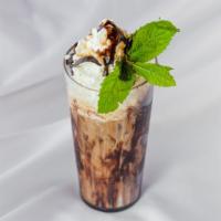 Turkish Cold Brew · Cooled turkish coffee mixed with cream, caramel sauce, chocolate sauce, and whipped  cream!