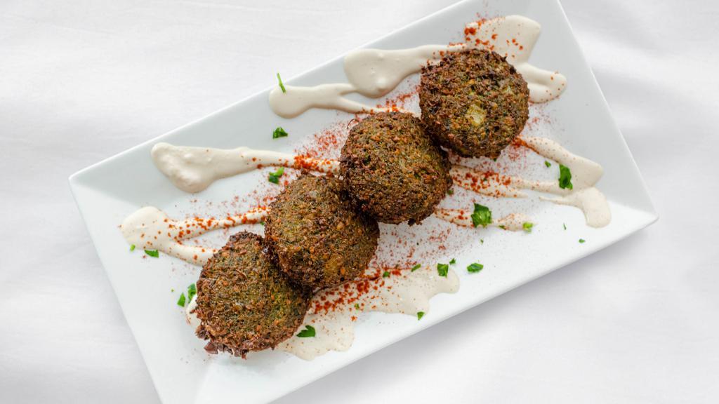 Falafel Balls · Garbanzo beans, parsley, onion, and spices formed into balls and fried. Served with tahini. VGN GF
