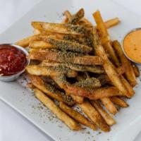 Zaatar Fries · House cut fries tossed in zaatar and served with harissa sauce. VGN GF