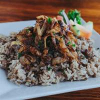 Majadra · Brown lentil jasmine rice topped with caramelized onions. VGN GF