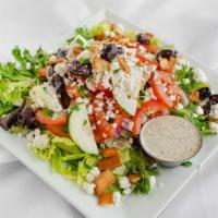 Lebanese Salad · Organic mixed greens, tomatoes, cucumbers, onions, feta cheese, olives, topped with our hous...
