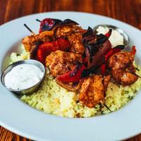Chicken Breast Kabob Plate · Chicken breast marinated in olive oil, garlic, yogurt, paprika, and lemon. Served with two s...