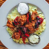 Chicken Thigh Kabob Plate · Chicken thigh marinated in olive oil, garlic, paprika, and lemon. Kabob plates are served wi...
