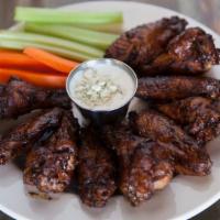 Smoked Wings · Gluten-free. Large cherry wood smoked wings coated with our own blend of spices, then smoked...