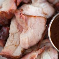 Tennessee Tangos · Gluten-free. Pork rib ends, dry rubbed and smoked, sliced into bite-sized pieces. Served wit...