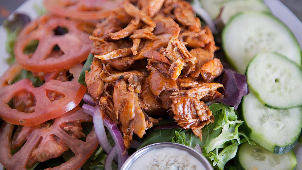 Bbq Salad · An entree size salad of mixed greens, tomatoes, red onion & cucumber topped with your choice: sliced chicken breast, four slices of bacon, or 4 oz pork brisket, turkey or buffalo chicken.