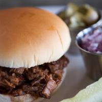 Texas Chopped Beef Sandwich · Gluten-free. Smoked beef brisket Chopped & sautéed in our tangy sauce served with chopped re...