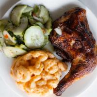 Dixie Chicken · Dry-rubbed chicken served on the bone. Fruit wood smoked, served golden brown and sweet & ju...