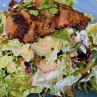 Steak Salad · Chimichurri marinated flank steak, baby lettuce, tomato, cucumber, red onion, radish, blue c...