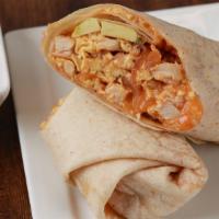 Chicken Or The Egg · Scrambled eggs, chicken, salsa, avocado, sauteed onions and melted shredded cheese rolled in...