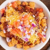 New!: Chili Totchos · Large portion of crispy tater tots, our award winning beef and bean chili, shredded cheddar ...