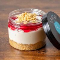Strawberry Cheesecake Jar  · Our Original Cheesecake topped with glazed strawberries and vanilla crumble.