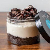 Oreo Cheesecake Jar  · Creamy Vanilla Cheesecake on chocolate oreo crust, with layers of oreo crumbles and Ghirarde...
