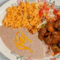 Chile Colorado · Spicy. Beef simmered until very tender in a red sauce, tomatoes, onions, mild peppers, and s...