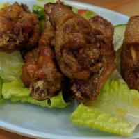 Hot & Spicy Chicken Wings (15 Mins) / Cánh Gà Chiên Nước Mắm · Spicy. Fried chicken wings tossed in sweet and spicy sauce with a choice of fish sauce or sw...