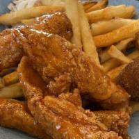 4 Piece Tennessee Leg Combo · Hand battered or naked drumsticks tossed in the sauce or rub of your choice
