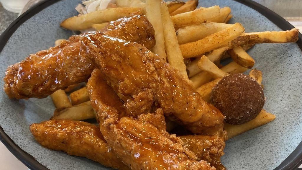 4 Piece Tennessee Leg Combo · Hand battered or naked drumsticks tossed in the sauce or rub of your choice
