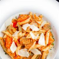 Penne Siciliana · Italian sausage, tomatoes, green peppers, onions, shaved Parmesan, tomato, and butter sauce.