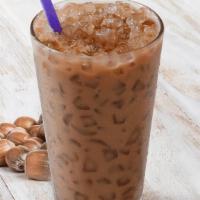 Iced Coffees|Hazelnut Iced Coffee · Our premium espresso shots blended with our specially developed hazelnut powder and served o...