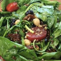 Black Goddess · A rich, delicious, protein packed Greek salad. Arugula, spinach, black beans, chickpeas, qui...