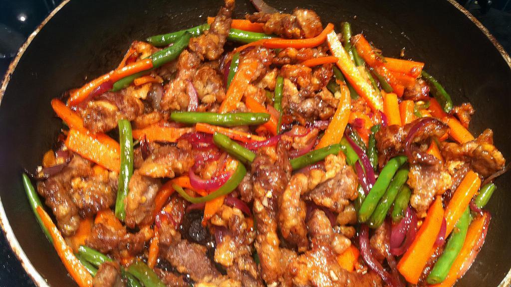 Shredded Pork With Hot Garlic Sauces · Hot and spicy.