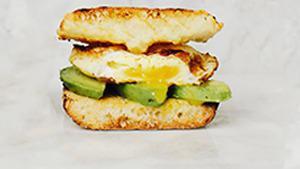 1/2 Avo, Egg & Cheese Sandwich · avocado, pasture-raised fried egg*, white cheddar & carrot lime habanero hot sauce (Vg, D, E...