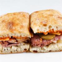 Smoked Pastrami Combo · smoked pastrami, white cheddar, caramelized onions, smoked aioli & dill pickles (D, GF*). Pl...