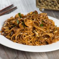 Malaysian Noodles · Flat rice noodles stir-fried with tofu, egg, fresh garlic and our spicy, Malaysian-style hou...