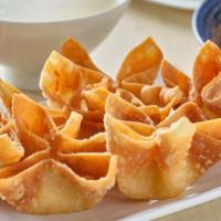 Cream Cheese Rangoon (6 Pcs) · Wonton skins filled with cream cheese fried until crispy, crunchy and golden on the outside ...