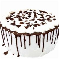Chocolate Delight Ice Cream Cake · Two layers of chocolate cake, interspersed with two layers of chocolate ice cream with choco...