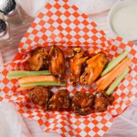 Chicken Wings  (8) · Traditional or boneless. & now popcorn style. Served with choice of sauce( If you pick 2 sau...